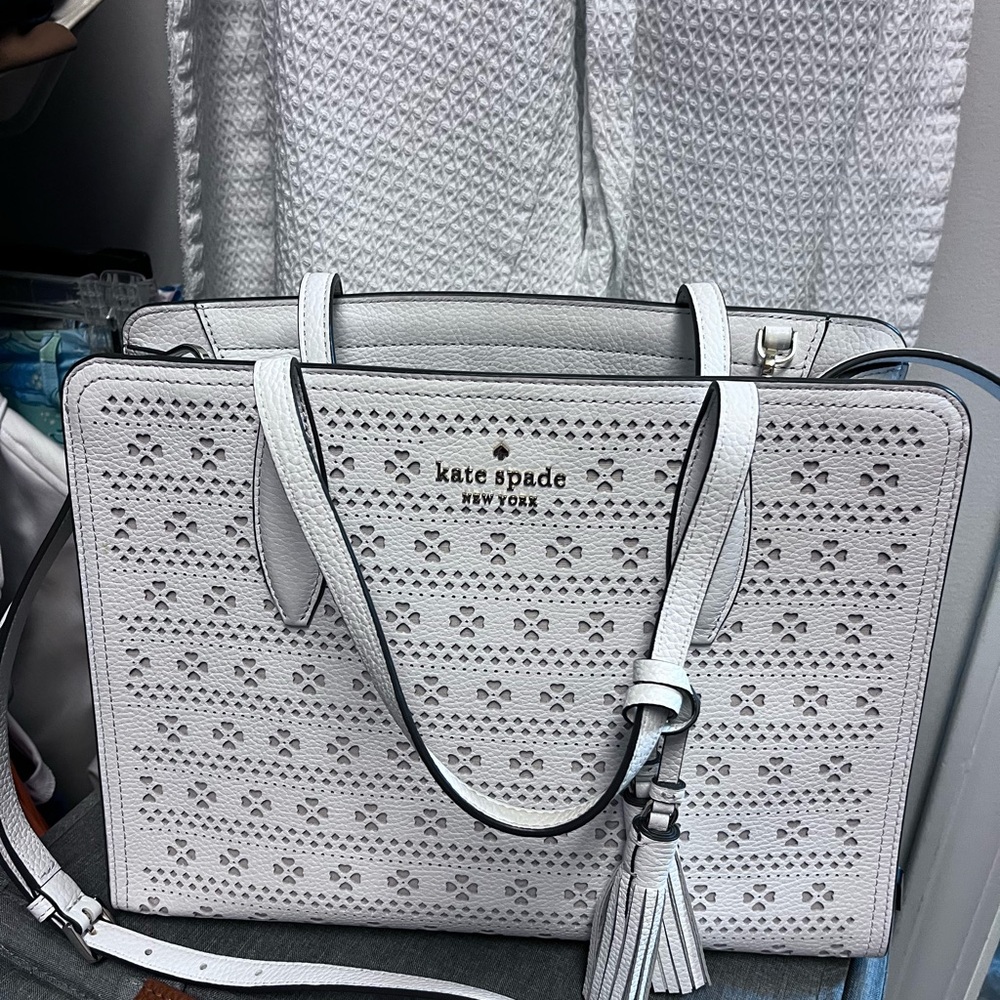 kate spade white perforated satchel with tassel